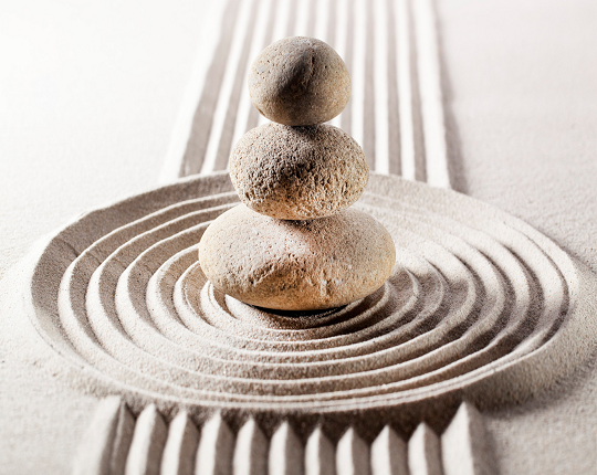 Zen stones on sand